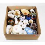 A mixed lot of assorted cabinet china to include Wedgwood blue jasper heart shaped trinket box,