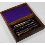 An early 20th century rosewood cased draughtsmans set