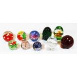 A collection of ten modern glass paperweights