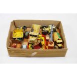 A collection of loose playworn diecast toy vehicles to include Dinky Supertoys, Euclid rear dump