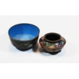A Japanese cloisonné bowl, of squat circular form, typically decorated with flowers, dia.9cm;