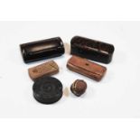 A late 19th century pocket snuff box in the form of a walnut, having brass mount; together with a