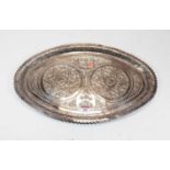 An middle eastern white metal oval tray with chased decoration, 22.5oz, width 45cm