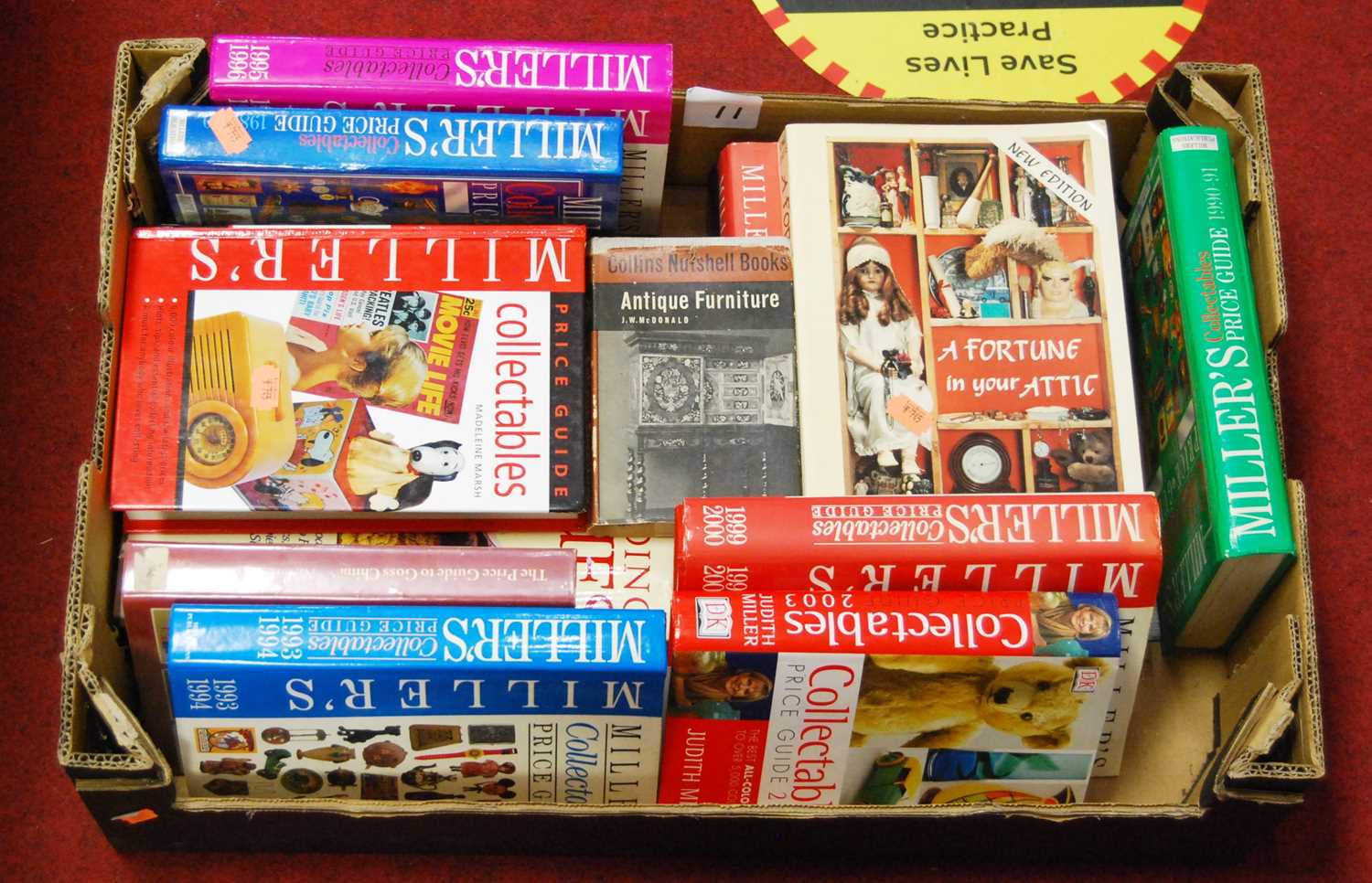 A box of assorted hardback antiques reference books, mainly being Miller's Guides