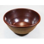 A John Leach brown glazed studio pottery bowl, dia.31cm