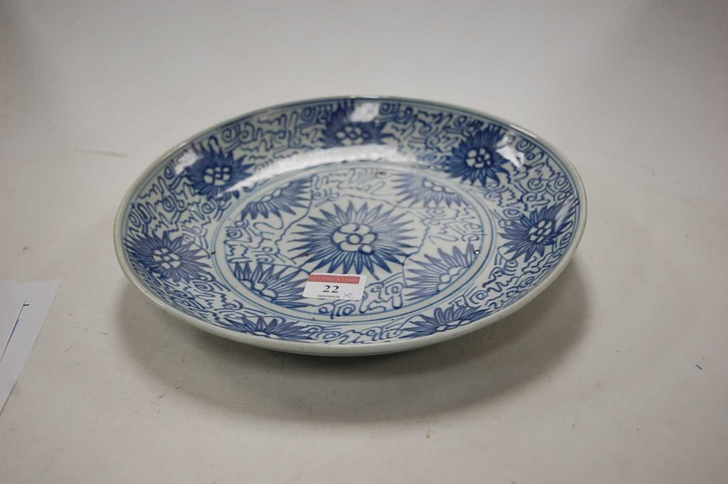 A 19th century Chinese blue and white export plate, decorated with flowers and bamboo, dia.28cm; - Image 6 of 9