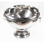 A large silver plated rose bowl, of circular form, flanked by twin ring handles, standing on a