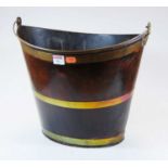An early 20th century tin peat bucket, decorated in the traditional style, of navette form, with