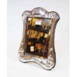 An Art Nouveau style silver and embossed easel photograph frame, 29cm