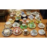 A large collection of Victorian and later porcelain cabinet cups and saucers, to include Spode,