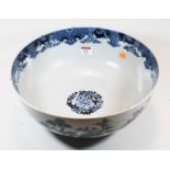A large 19th century Chinese export blue and white punch bowl, the interior having typical floral