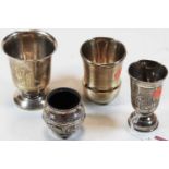 Assorted Middle Eastern white metalwares, being various beakers, small travelling lamp, and an