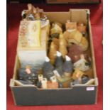 A box of various resin cottage ornaments, to include David Winter St George's Church, Tudor Manor
