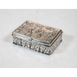 A late Victorian silver and embossed table snuff box, the hinged cover decorated with allegorical