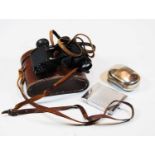 A pair of German 6x24 binoculars marked CP Goez, Berlin, in a fitted stitched brown leather case,