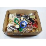 A box of miscellaneous modern costume jewellery to include various bangles, faux pearl necklaces