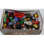 A box of loose and playworn diecast toy vehicles to include Corgi Juniors tanker, Hoveringham tipper