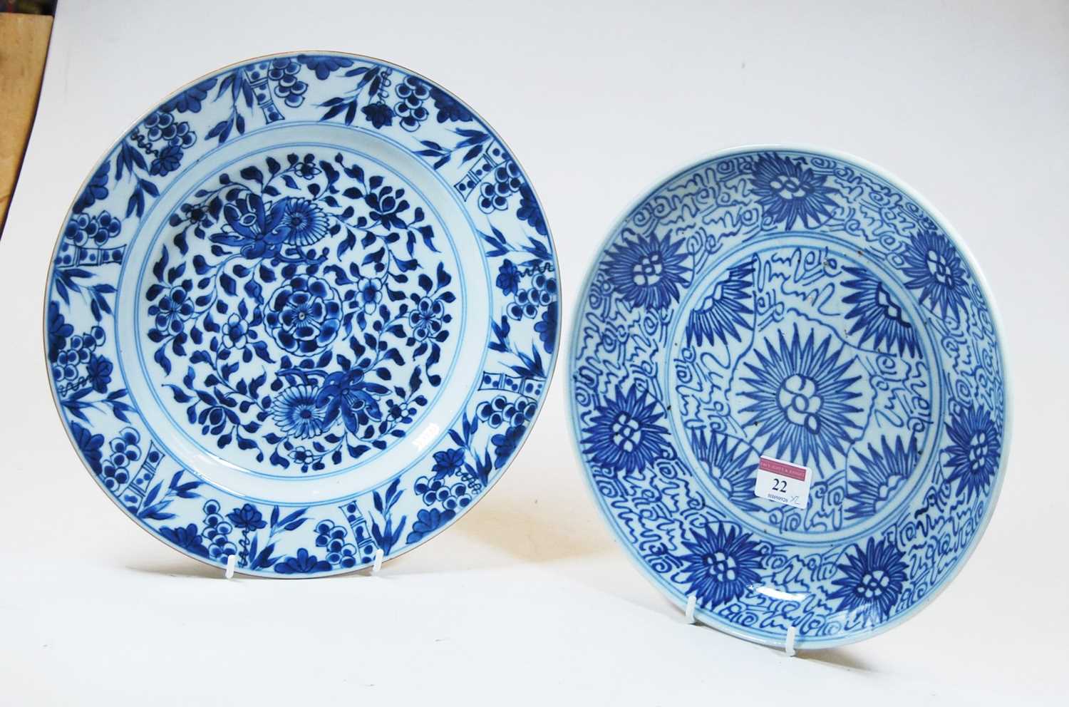 A 19th century Chinese blue and white export plate, decorated with flowers and bamboo, dia.28cm;