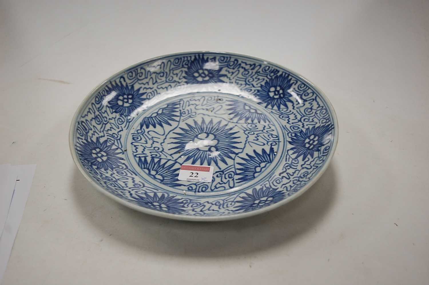 A 19th century Chinese blue and white export plate, decorated with flowers and bamboo, dia.28cm; - Image 5 of 9