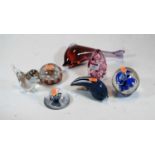 A collection of seven various modern glass paperweights, to include bird examples