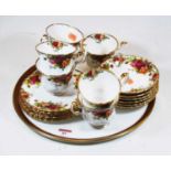 A Royal Albert Old Country Roses part tea service; together with a porcelain tea tray