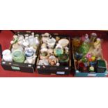 Three boxes of mixed ceramics and glassware, to include various paperweights, vases etc