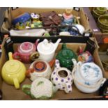 Two boxes of mixed ceramics, to include various teapots, riding crop, glass vase etc