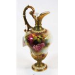 A Royal Worcester porcelain pedestal ewer decorated with cabbage roses on a shaded ground, shade No.