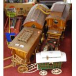 Assorted scratch-built wooden 'gypsy' caravans; together with a china shire-horse