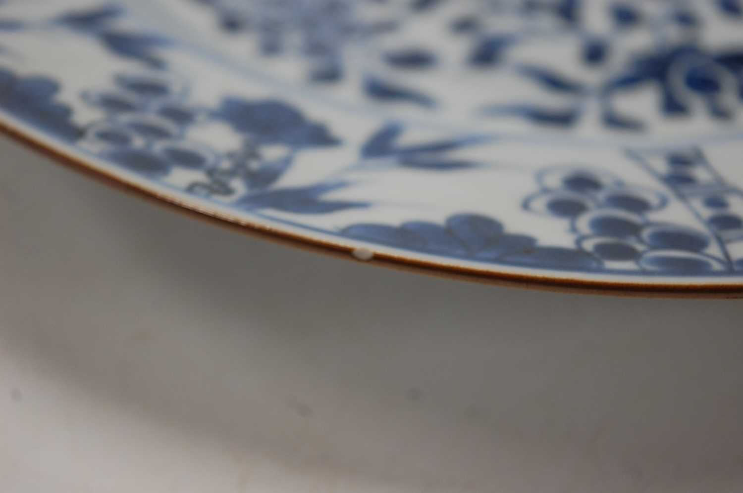 A 19th century Chinese blue and white export plate, decorated with flowers and bamboo, dia.28cm; - Image 2 of 9