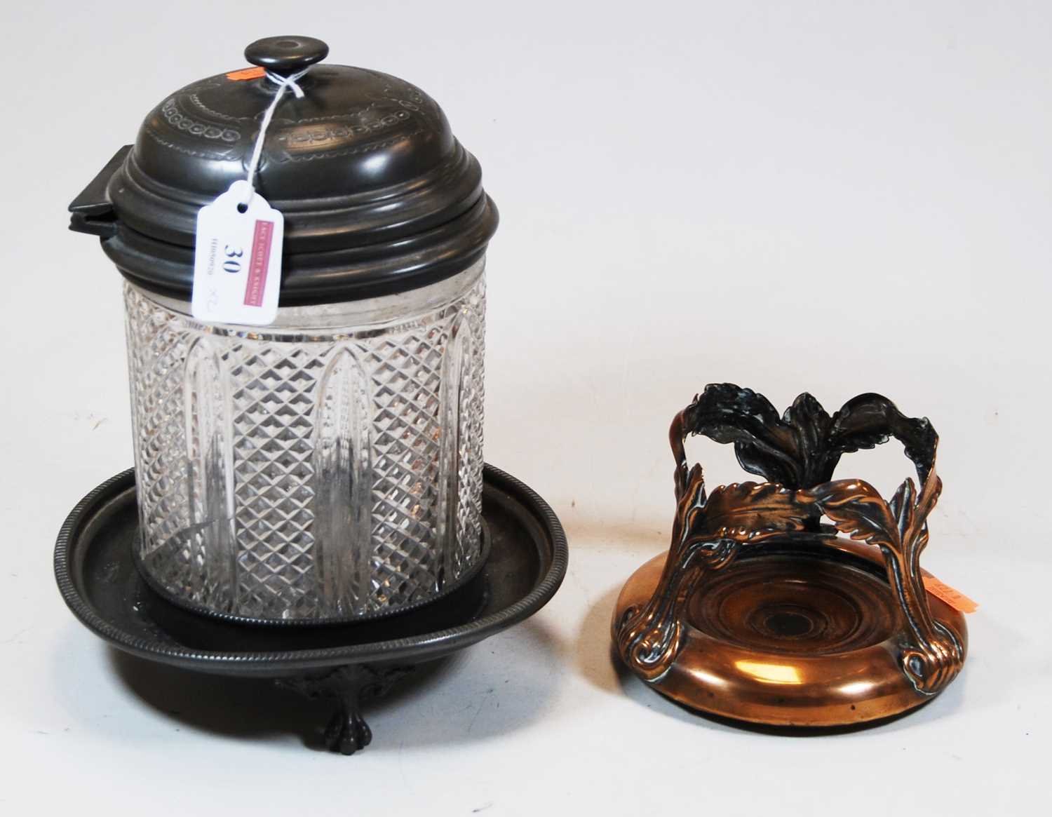 A 20th century cut glass and pewter lidded jar, on stand, h.23cm; together with a copper stand (2)