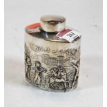 A late Victorian silver and embossed tea canister, decorated in the round with allegorical figure