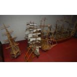 A collection of scratch-built balsa wood models of gunships, principally being three-masted, the
