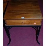 A contemporary beech low single drawer occasional table, raised on iron supports