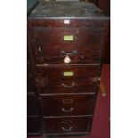 A 1930s stained ply four drawer office filing cabinet, w.51cm