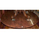 A contemporary heavy glass circular pedestal breakfast table, with faux figured walnut effect top,