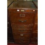 The Oxford Cabinet Company Ltd - a 1930s stained ply four drawer office filing cabinet, w.51cm