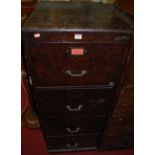 A 1930s stained ply four drawer office filing cabinet, w.51cm