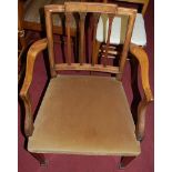 A set of eight walnut Sheraton style dining chairs, each having upholstered stuffover seats (6+2)