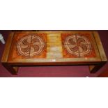A 1970s teak and tile top inset rectangular coffee table, length 126cm