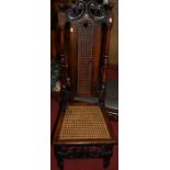 Two similar Caroleon and later period walnut cane back and seat high-back dining chairs