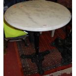 A black painted cast iron and white variegated marble topped circular pedestal pub table, dia.60cm