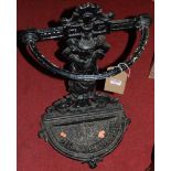 A Victorian later black painted cast iron demi-lune stick stand, width 41cm