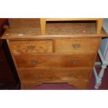 An early 20th century oak chest of two short over two long drawers, w.94.5cm
