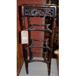 A circa 1900 Chinese carved hardwood square plant stand, raised on bamboo effect carved supports