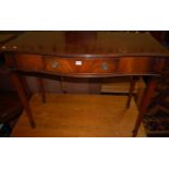 A reproduction mahogany serpentine front single drawer side table, w.105cm
