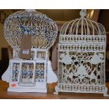 Two white painted hanging bird cages