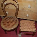 An early 20th century child's bentwood cane seat bedroom chair; together with a near-matching