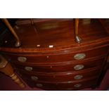 A 19th century mahogany crossbanded and boxwood strung bowfront chest, of four long graduated