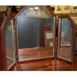 A contemporary triptych dressing mirror